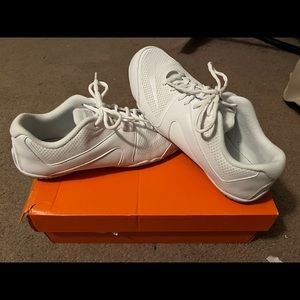 Size 10.5 Nike girls cheer shoes. Womens size. Worn once for tryouts.